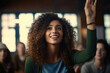 © visoot - Happy African American woman student raising her hand to ask a question during listen lecture in the classroom.