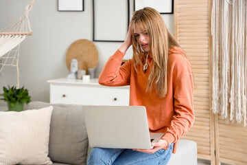 Sticker - Upset teenage girl with laptop video chatting at home