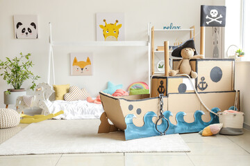 Poster - Pirate cardboard ship with toy bear in children's bedroom