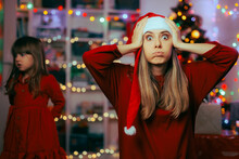 Exasperated Mother Feeling Stressed During Christmas Holidays. Shocked Mom Feeling Under Pressure Organizing Xmas Party
