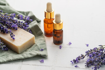 Wall Mural - Essential oils and handmade soap. Natural herb cosmetic with lavender flowers