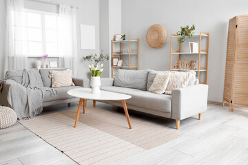 Interior of modern living room with sofas and coffee table