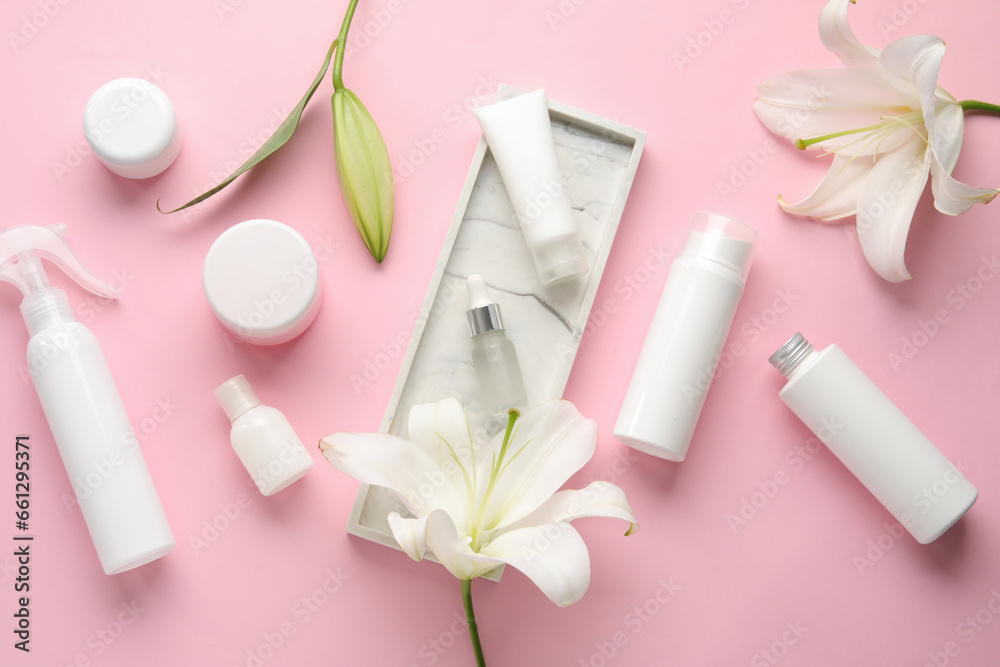 Composition with different cosmetic products and beautiful lily flowers on pink background