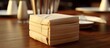 paper napkins in bamboo wood box on dining table