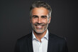 © Synthetica - Studio portrait of handsome mature businessman wearing suit.