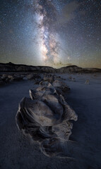 Cracked eggs rock formations under the Milky Way in badlands in New Mexico, USA