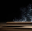 Empty wooden table with smoke, steam on dark background. Insert your text.
