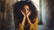 Anxious stressed frustrated depressed black woman sitting in bedroom, facing major depressive disorder