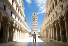 Man Poses With Leaning Tower Of Pisa Illusion In Italy.