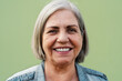 © Alessandro Biascioli - Happy senior woman smiling in front of camera - Elderly people lifestyle concept