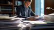 © MP Studio - Businessman hands working in Stacks of paper files for searching information on work desk in office, business report papers.