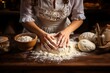 © Javier - Caucasian woman making bread on antique wooden table