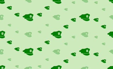 Poster - Seamless pattern of large and small green police cap symbols. The elements are arranged in a wavy. Vector illustration on light green background