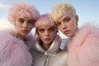 © Glittering Humanity - Three beautiful blonde women friends in a pink winter fur jacket. Pastel desert, fresh winter morning. Alien world on another planet. Glitter make up, pale skin and surreal landscape around them.