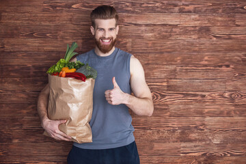 Wall Mural - Man with healthy food