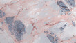 Zoom, gros plan sur un sol en marbre. Marbre coloré, rose. Arrière-plan pour conception et création graphique. 