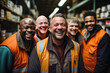 © Trinette Reed - Group portrait of mixed race men working in warehouse laughing
