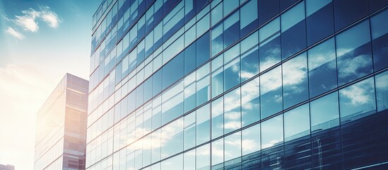 Sticker - Toned stock photo of a new high rise office building with modern features