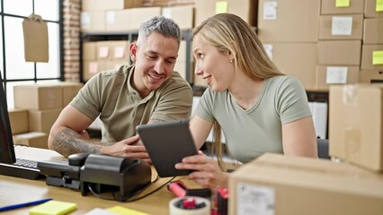 Poster - Man and woman ecommerce business workers using touchpad working at office