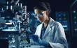 © piai - Female scientist working with microscope in laboratory. Medical research and development concept.