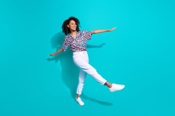 Canvas Print - Full length photo of cheerful optimistic girl going walking enjoying weekend free time isolated on cyan color background