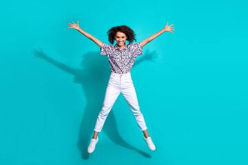 Canvas Print - Full length photo of overjoyed girl wear stylish clothes jump up rejoice celebration good mood isolated on cyan color background