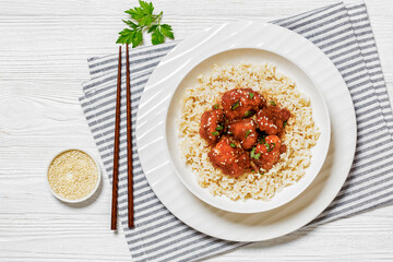 Wall Mural - Baked Honey Sesame Chicken with brown rice