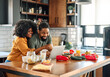 © Lumos sp - kitchen couple woman man food together cooking preparation ingredient laptop recipe internet computer happy love preparing eating home dinner vegetable relationship boyfriend girlfriend