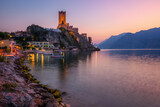 Fototapeta Londyn - Malcesine town on Lake Garda, Italy, on dramatic sunset