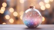 Minimalist new year concept. A close-up of a pastel pink decorative ball for the Christmas tree. Blurred lights in the background.