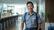 © MP Studio - Portrait of a male cleaner against the background of a house or hotel