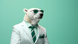 Cool polar bear with sunglasses against mint background 