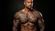 
Polynesian style tattoo on a man's muscular and athletic body. Patterns and designs on the body, skin painting.