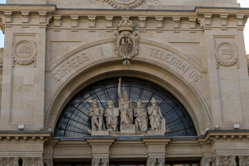 Valencia, Spain - September 23th, 2023: Communication Palace located in the Town Hall square. Frontal shot with the imposing facade characterized by Ionic style columns and pillars.