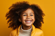 © Enrique - 8 year old black girl, Studio shot of a cheerful, cheerful woman happily. Isolated on bright background