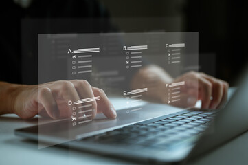 Assessment form, questionnaire, checklist and clipboard task management. Businessman working on laptop computer productivity checklist and audit form on website online. Document management system. DMS