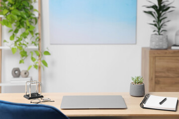 Canvas Print - Home workspace. Laptop and stationery on wooden desk indoors