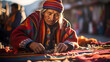 © Juan Gumin - Bolivian indigenous man preparing his crafts and fabrics to sell at the fair in La Paz, Bolivia. Latin American culture and tradition, aboriginal customs