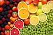 Freshness captured. Assorted citrus, berries, kiwi slices in closeup. Nutrition and wellness.