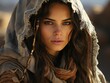 © Resdika Rawaty - Portrait of Beautiful Veiled Arab Women with Desert Background. Close up of Middle Eastern Women with Beautiful Eyes