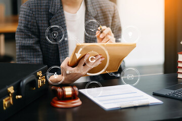 Wall Mural - Copyright or patent concept, Person hand using laptop computer, tablet and smartphone with virtual screen copyright icon trademark, Creation ownership against piracy. at office.