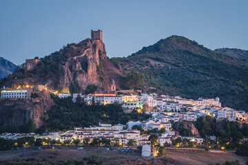 Wall Mural - Sunset landscapes of Zahara de la Sierra, an ancient village on the mountain with an ancient castle in Cadiz, Spain