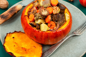 Poster - Tasty baked pumpkin with beef, mushrooms and apples.