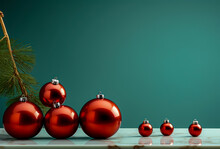 several red christmas balls on marble, on a green isolated background, copy space, christmas