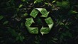 recycling logo with a leaf print and a green background of leaves and grasses