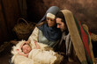 Loving parents live nativity scene