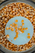 Close-up of shelled corn kernels in a container