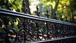 Wrought iron fence with intricate vine motifs.