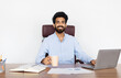© Prostock-studio - Engaged Indian Businessman in a White Office