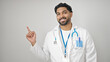© Krakenimages.com - African american man doctor smiling pointing to the side over isolated white background